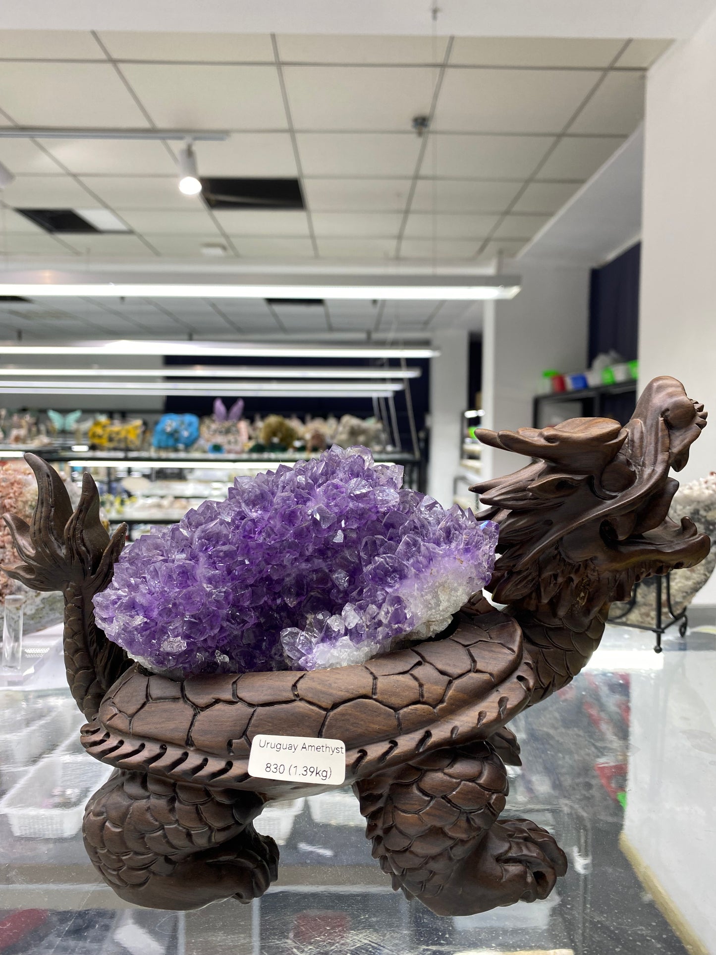 Uruguay Amethyst with Carving Wooden Stand